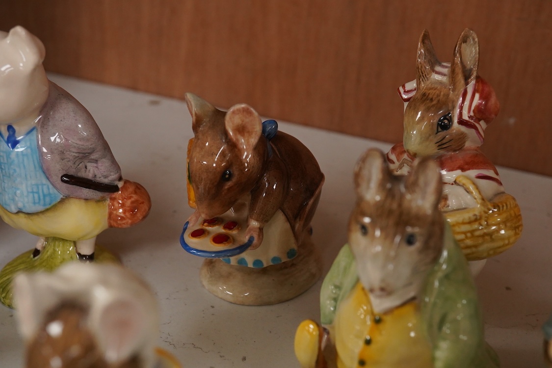 Twenty Beatrix Potter figures, mostly later production figures, largest 11cm high